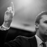 Considered by many as one of the best Cosmetics and Invisalign dentists in Mill Valley, Dr. Frances H. Yankie shows a photo of Charlie Kirk.